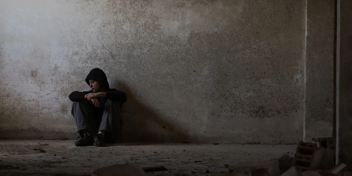 Depressed young main on the edge of despair.